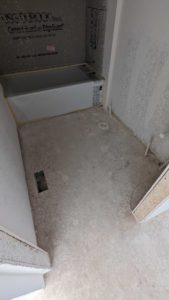 Main level bath with tub to be underlaid