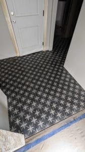 Laundry room floor grouted and finished