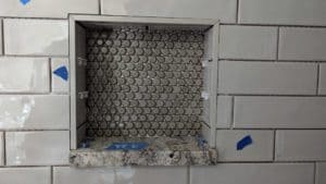 Niche in main level shower