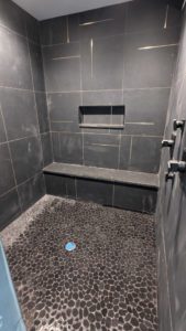 Master shower grouted and finished