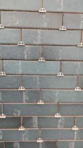 Upstairs tub surround tile closeup