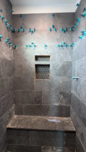 Master shower nearly done, but we're short tile5