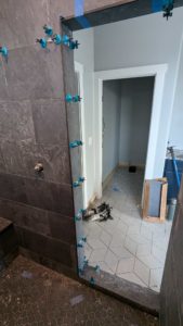 Master shower nearly done, but we're short tile2