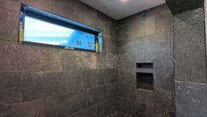 Master shower fully set except for a few tiles short2