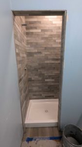 Basement shower surround grouted