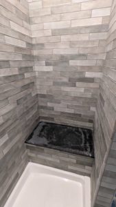 Basement shower surround grouted2