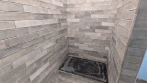 Basement shower surround grouted3