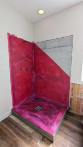 Shower pan and partial walls waterproofed