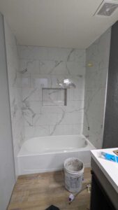 Tub surround grouted and finished