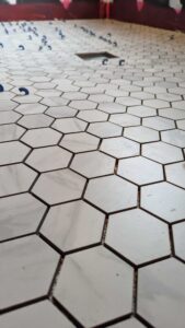 Closeup of shower floor hexagons