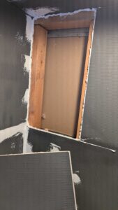 Installing the foam boards with sealant ijn and on all seams and screws