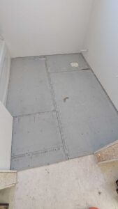 Guest bath floor underlaid