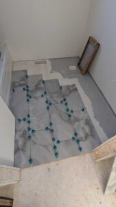 Part of guest bath floor installed