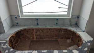 Master tub surround installed