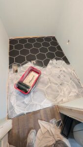 Grouting the laundry floor