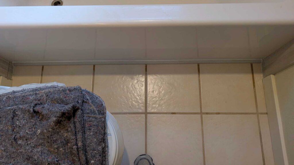 Joint to tub covered with quarter round Joint to tub covered with quarter round