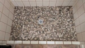 Shower floor grouted and finished