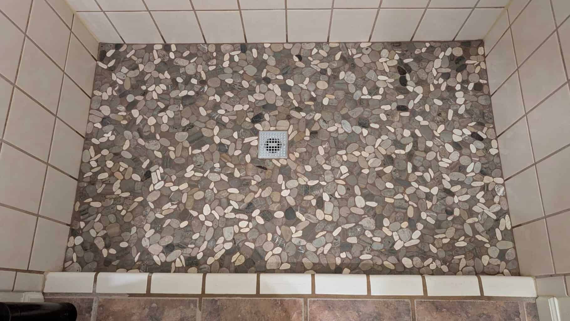 Shower floor grouted and finished Shower floor grouted and finished