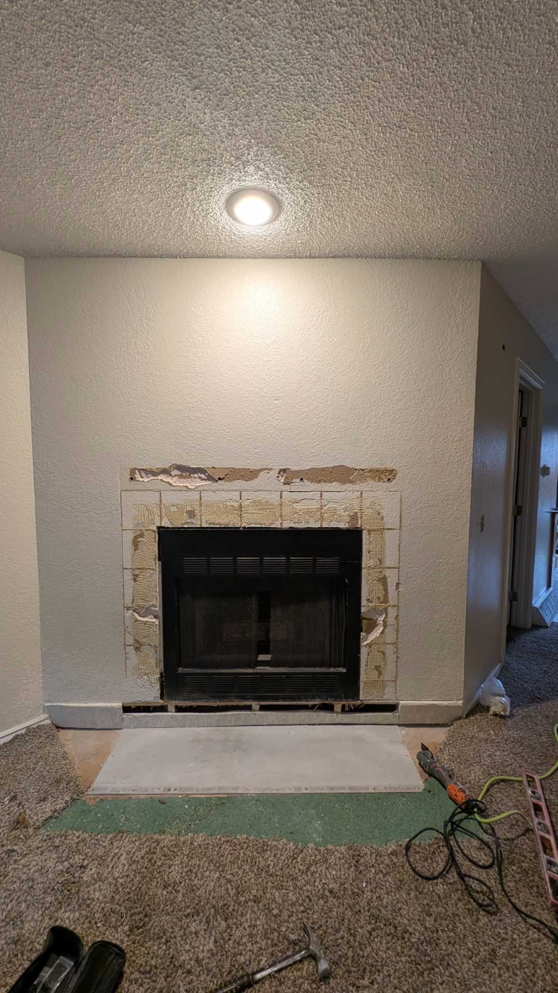 Removed VERY poorly done drywall to provide flat surface for tile Removed VERY poorly done drywall to provide flat surface for tile