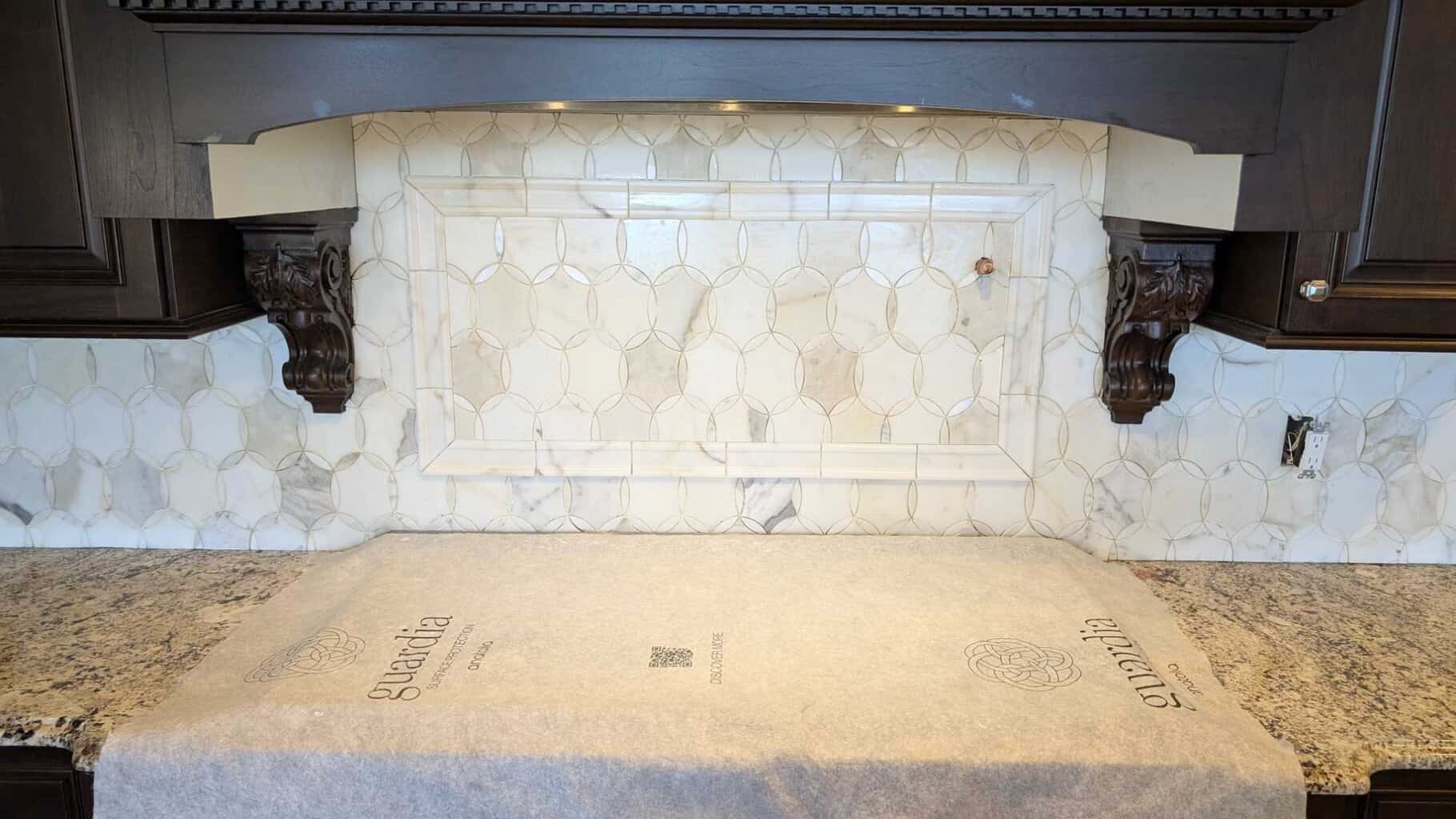 Accent frame above stove Accent frame above stove