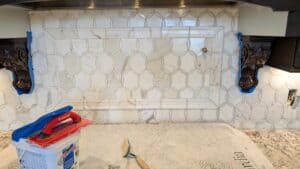 Backsplash being grouted
