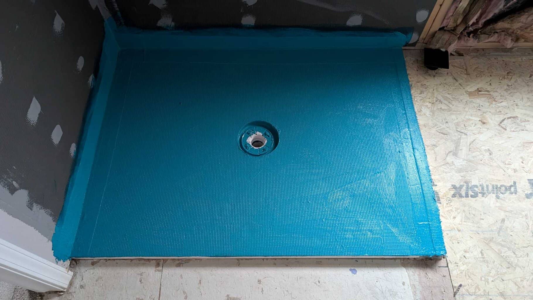 Master shower pan taped and waterproofed