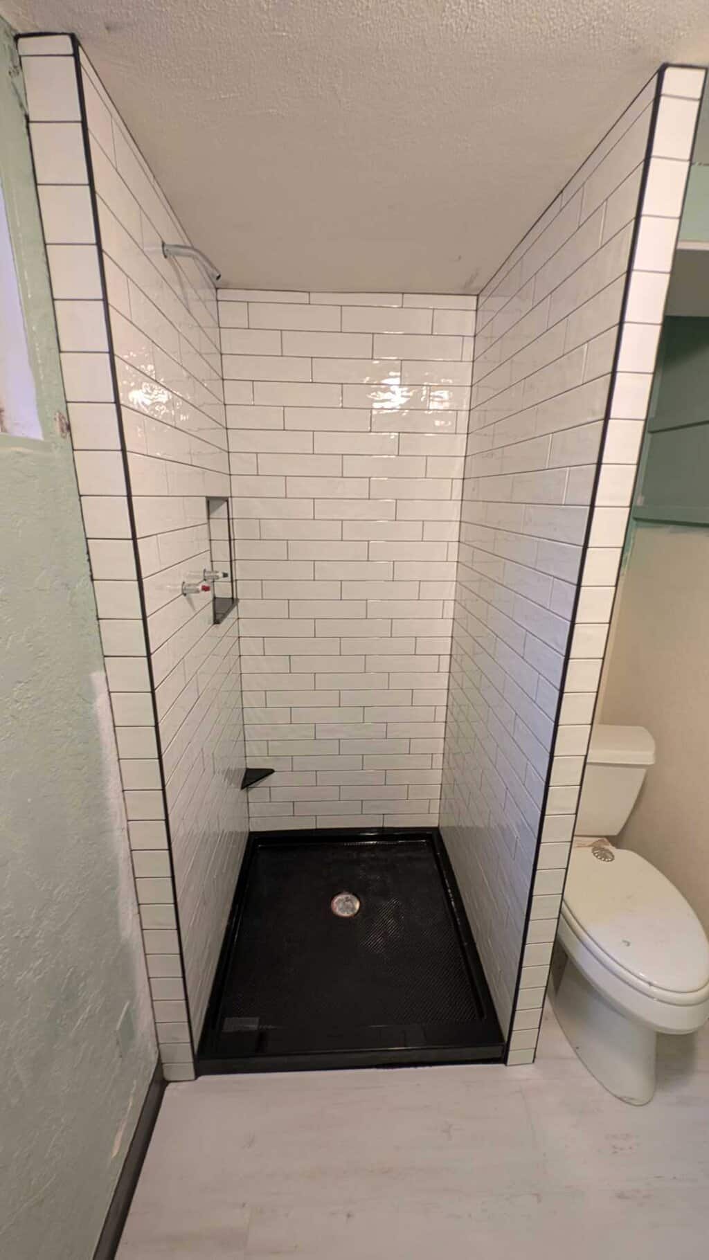 Basement shower grouted and finished2