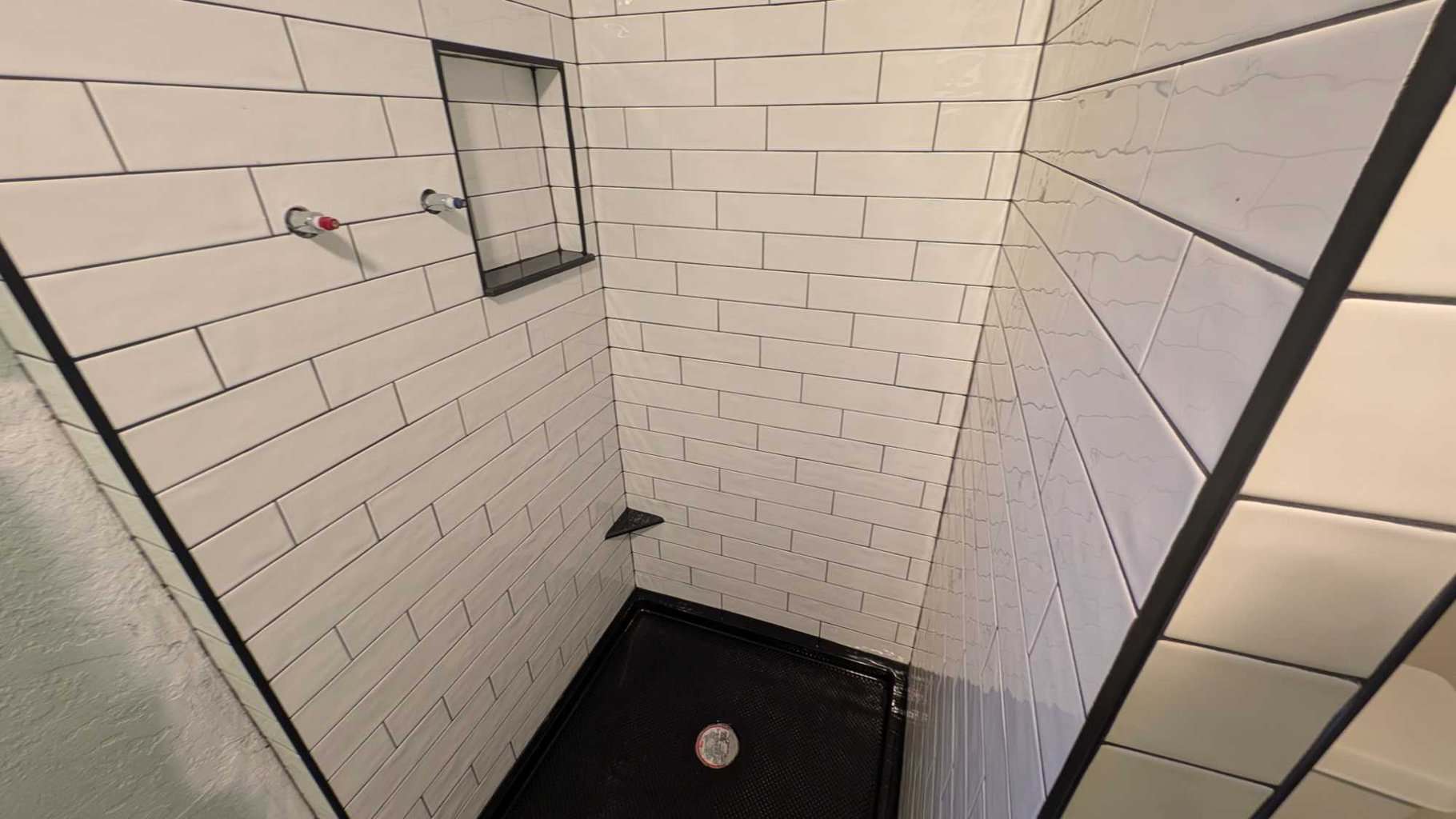 Basement shower grouted and finished4