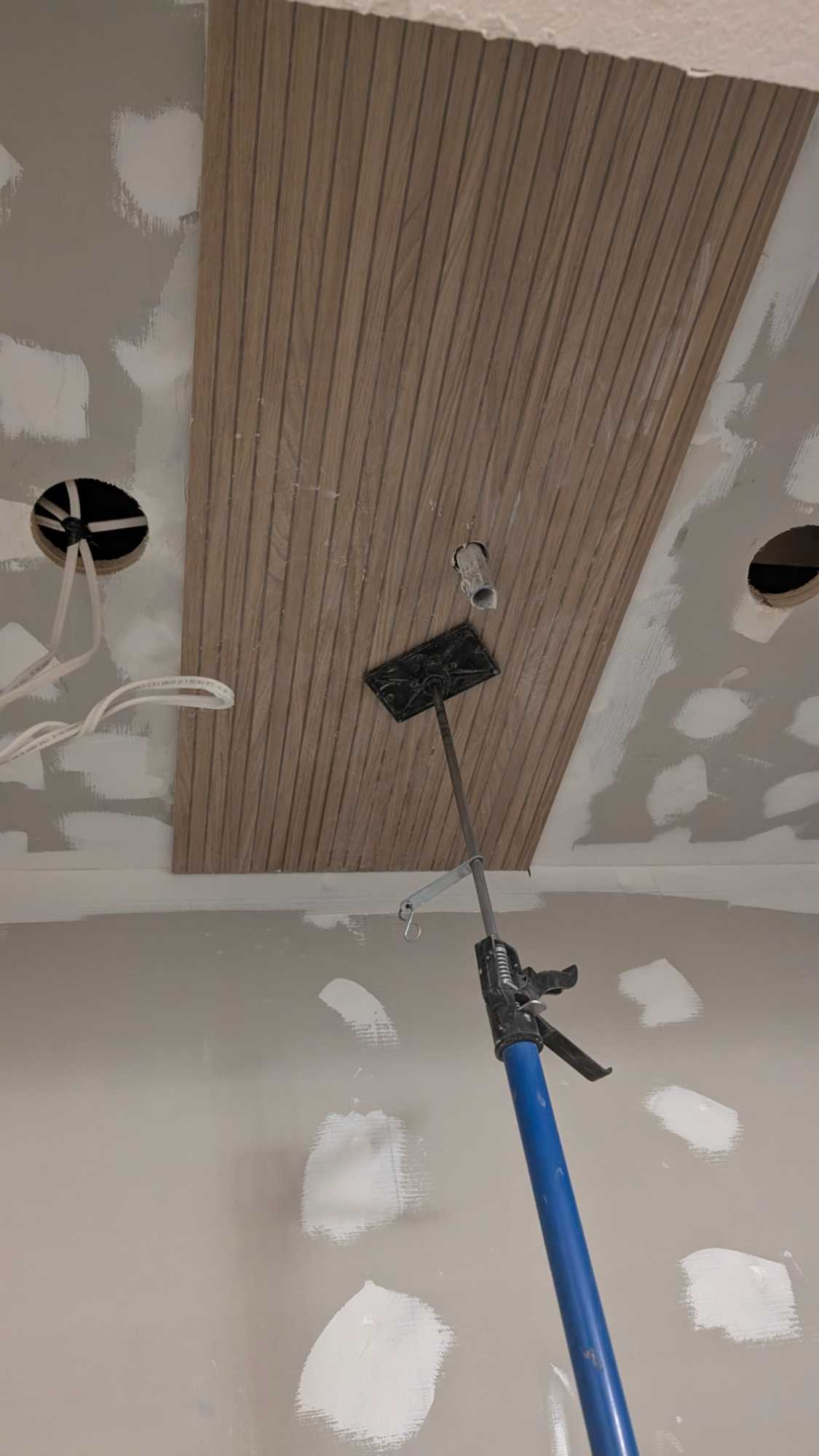 Starting to install ceiling tiles