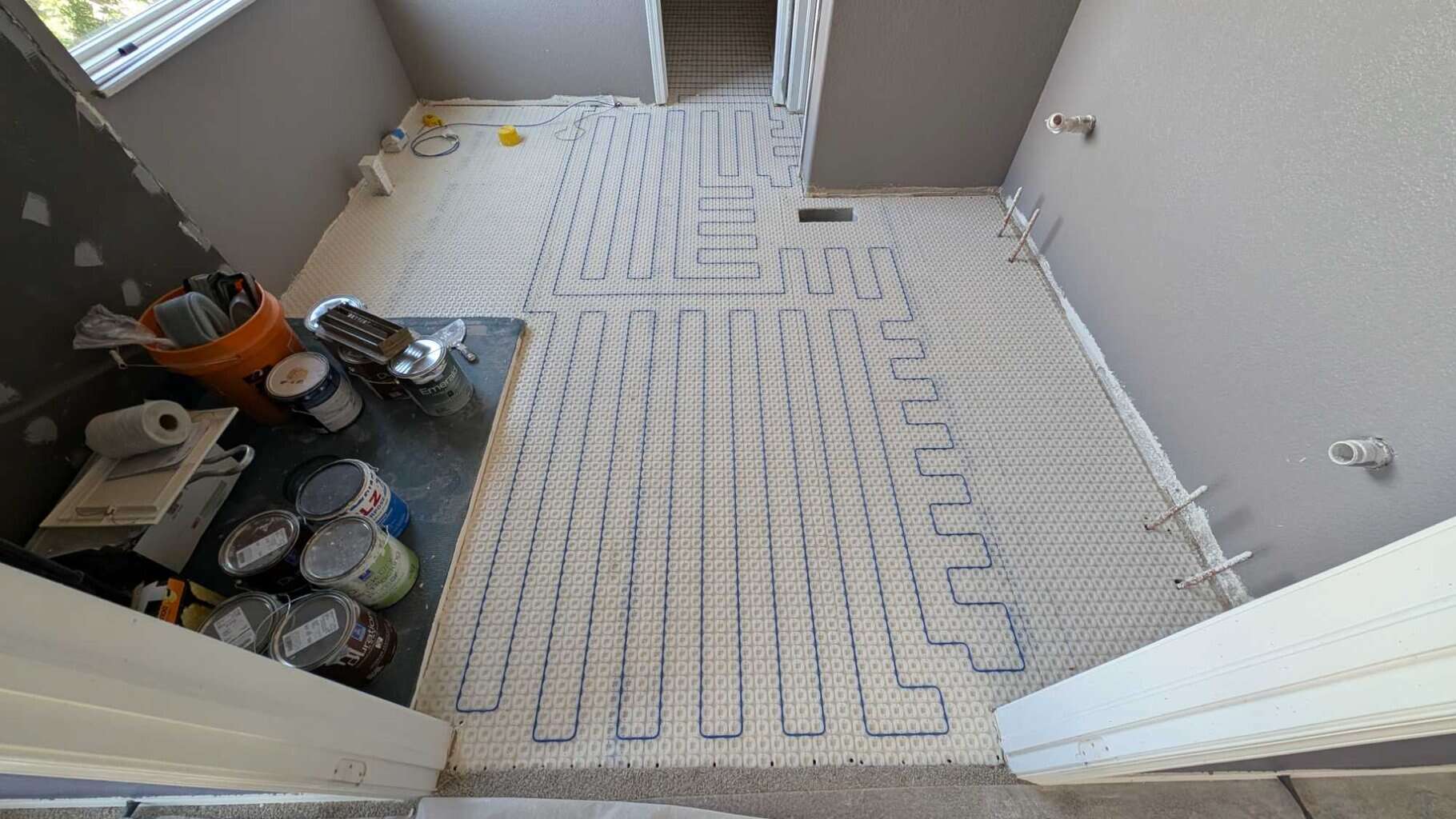 Warm wire installed in master bath floor