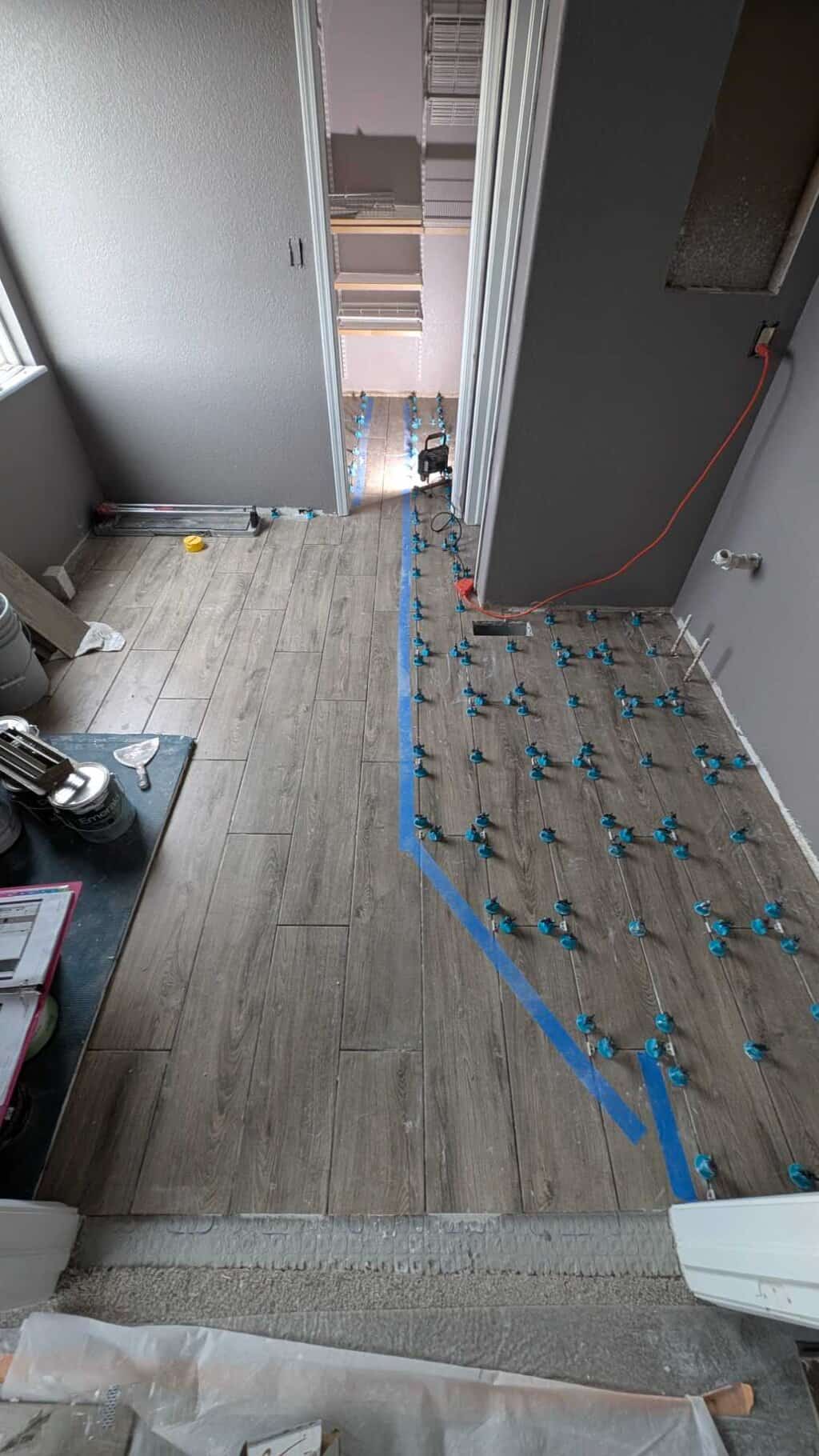 Master bath floor nearly complete