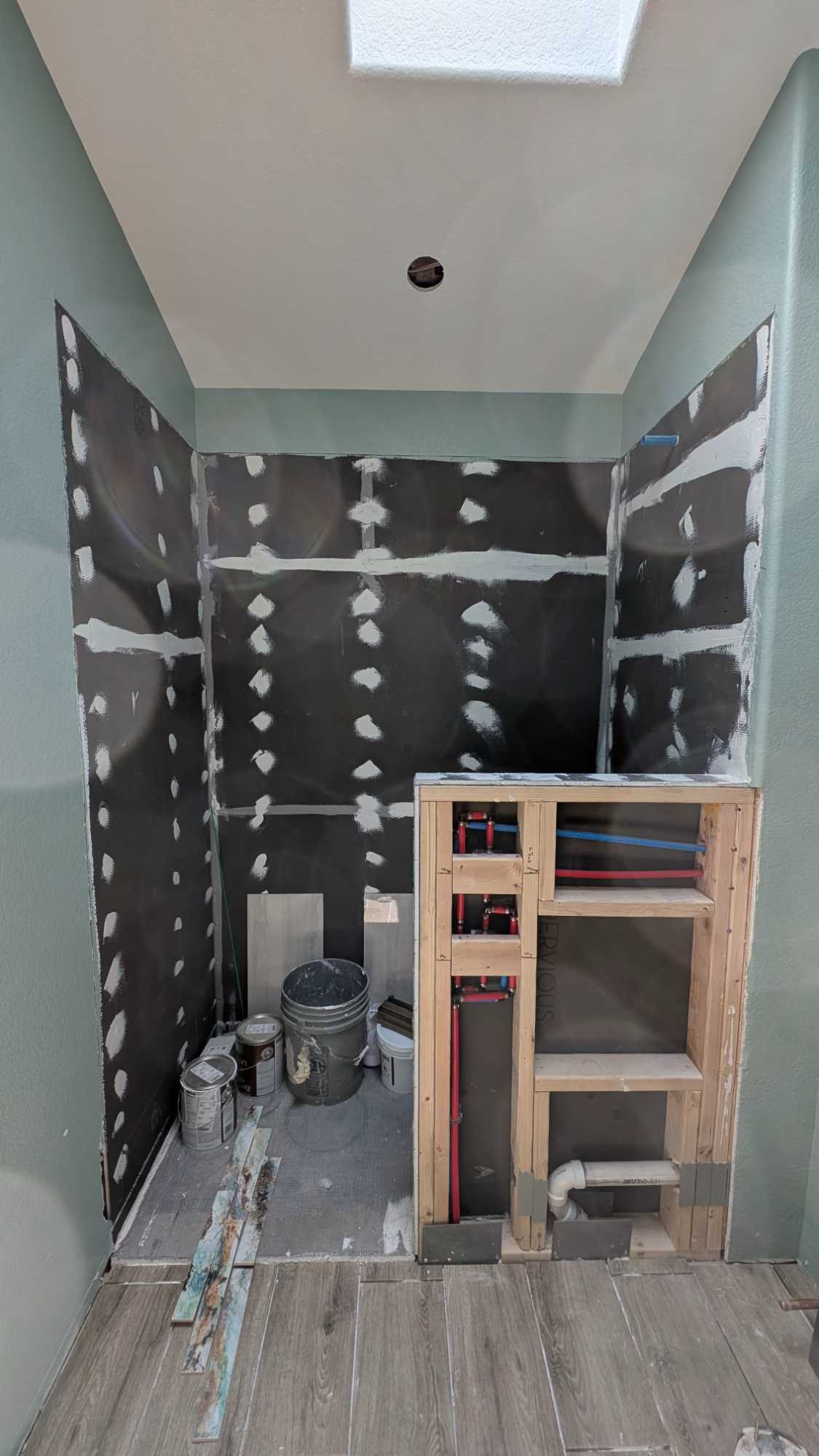 The layout and plan for the guest bath shower