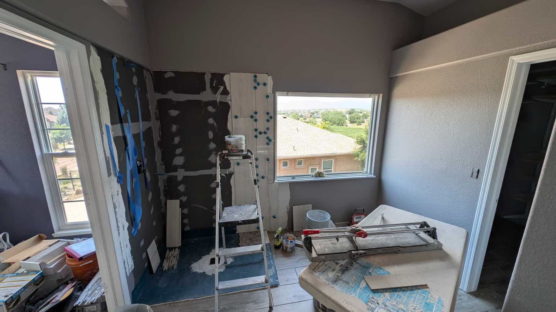 Starting to install master shower and wainscot