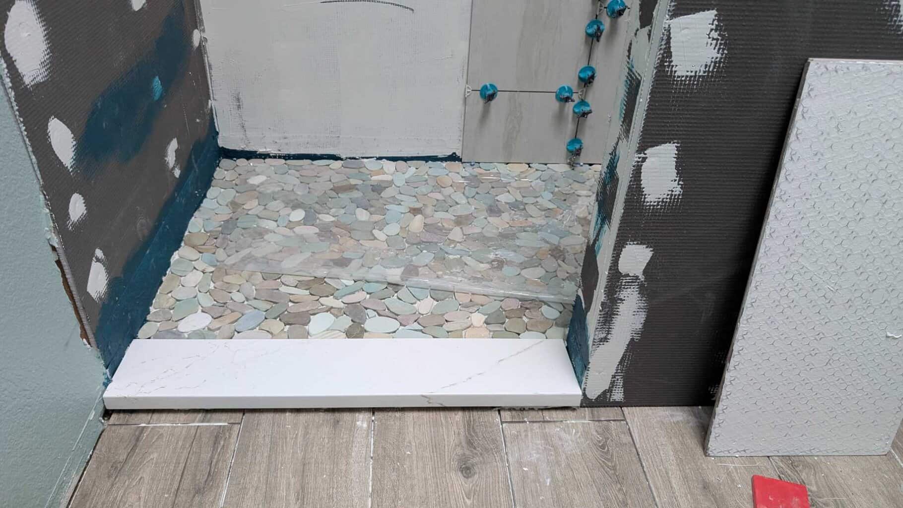 Completed the install of the guest shower floor and curb