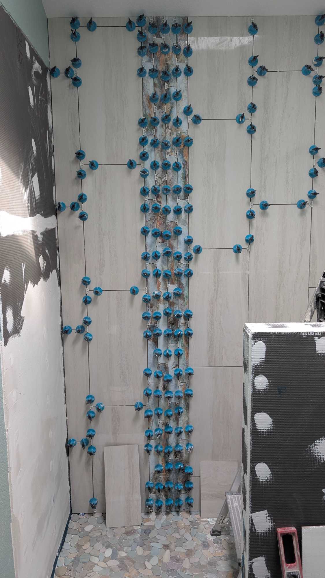 Installed accent band in hall bath shower