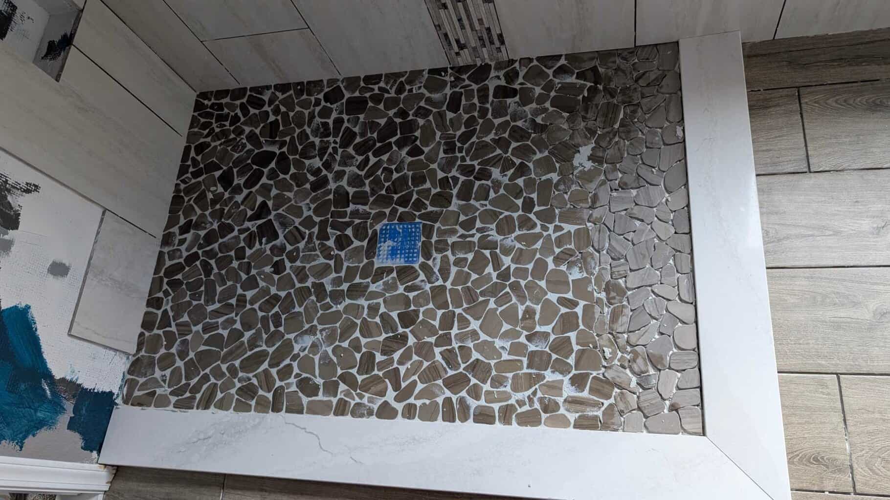 Epoxy grout going into primary shower - in progress