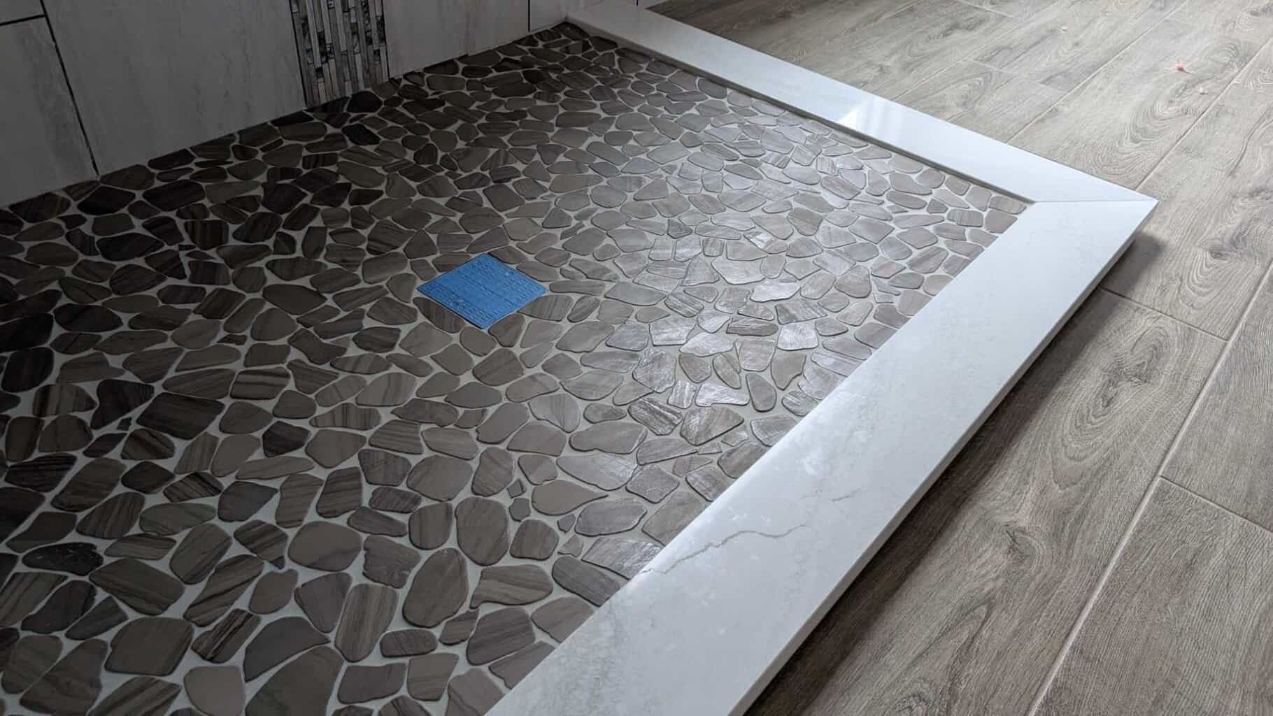 Primary bath shower floor grouted