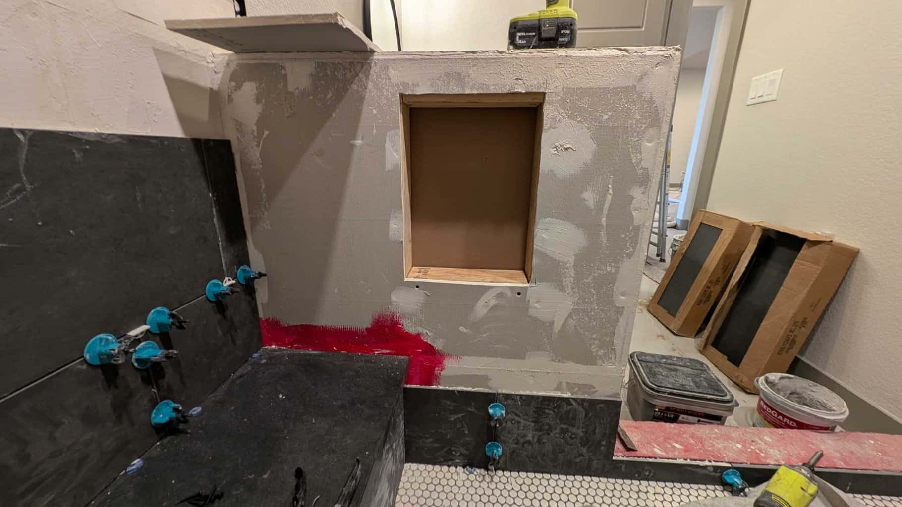 Niche cut in and supports installed
