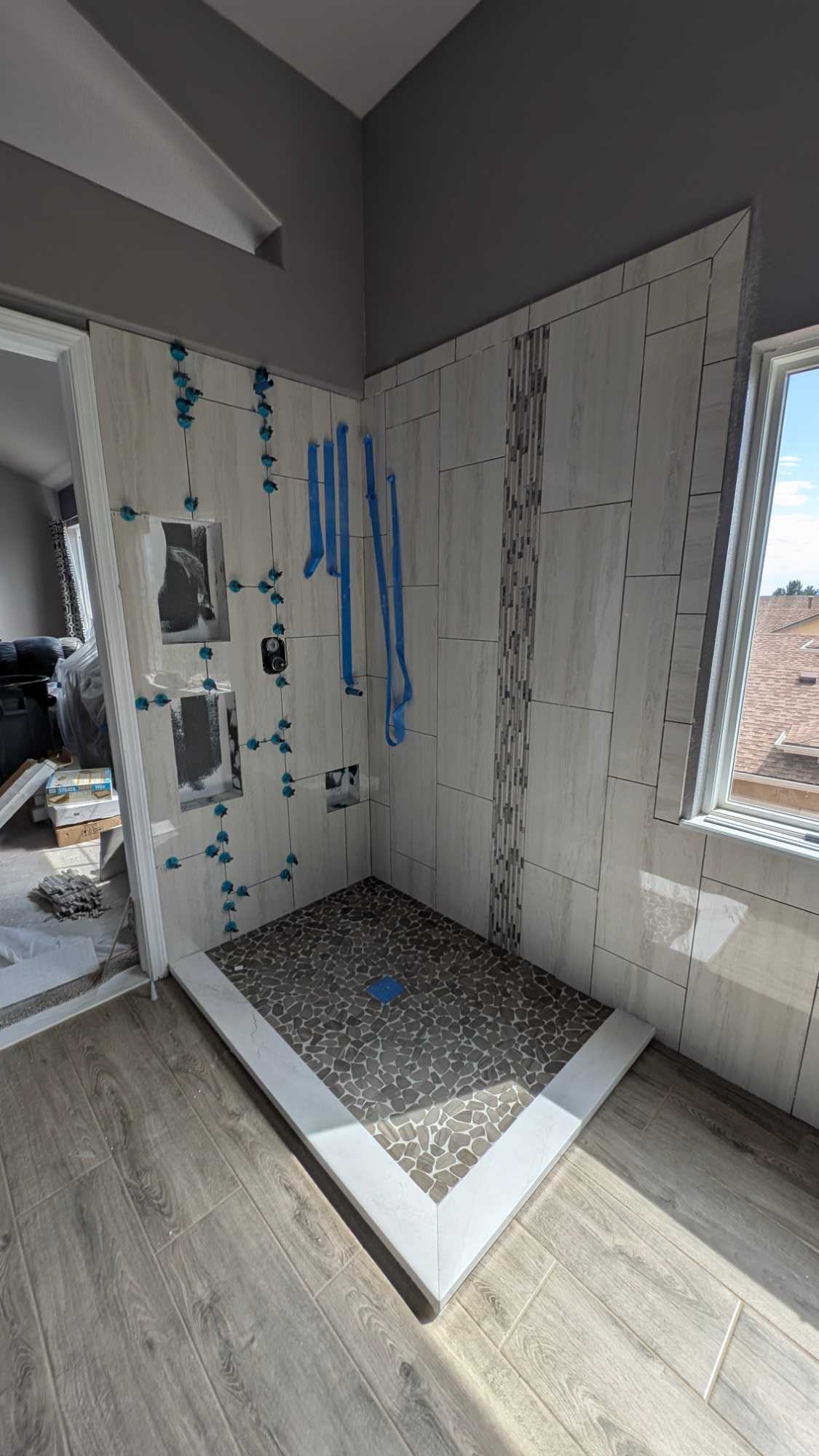 Principal shower ready to be measured for glass