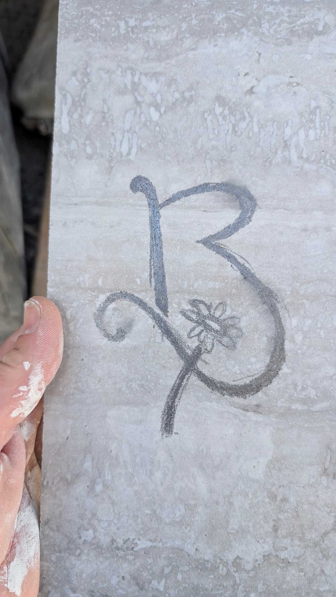 Sketching logo onto tile