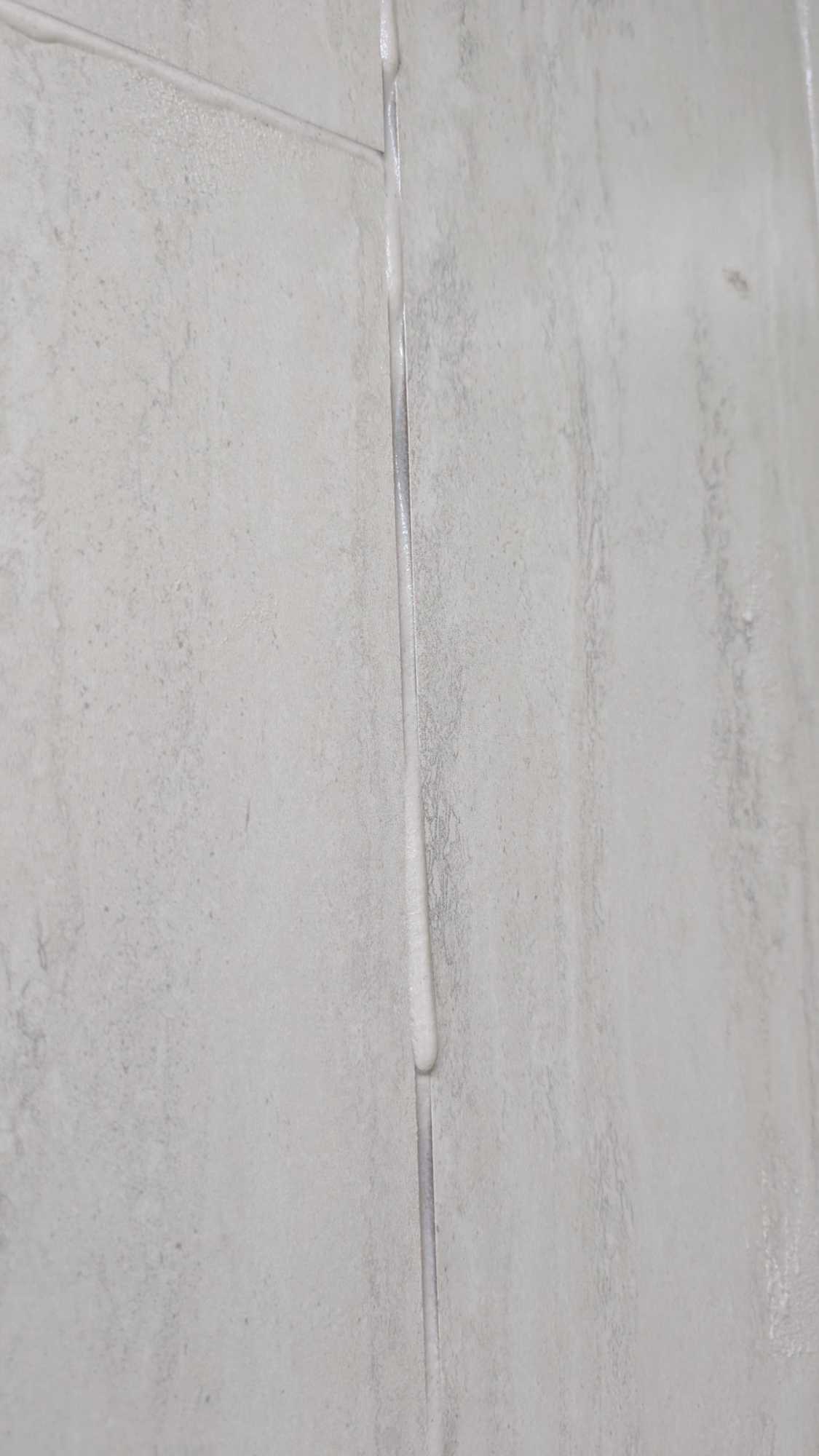 Major problem with epoxy grout slumping in the joints with one mix