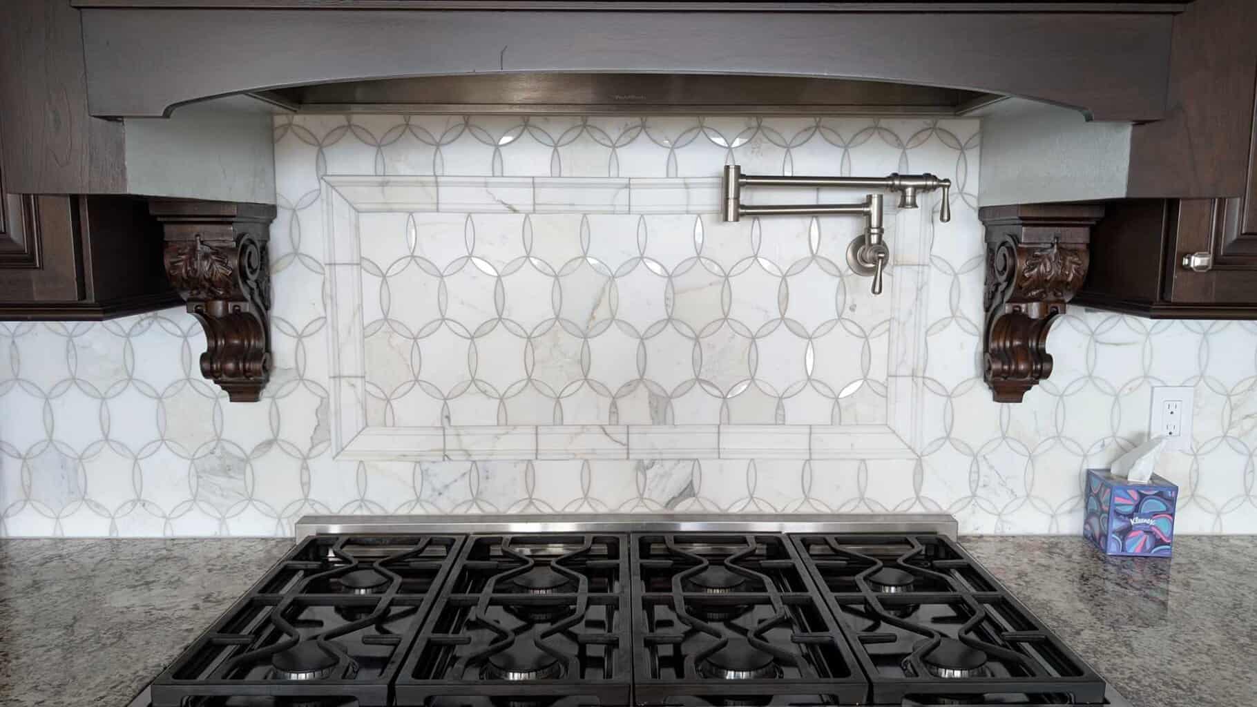 Finished stove top accent with pot filler