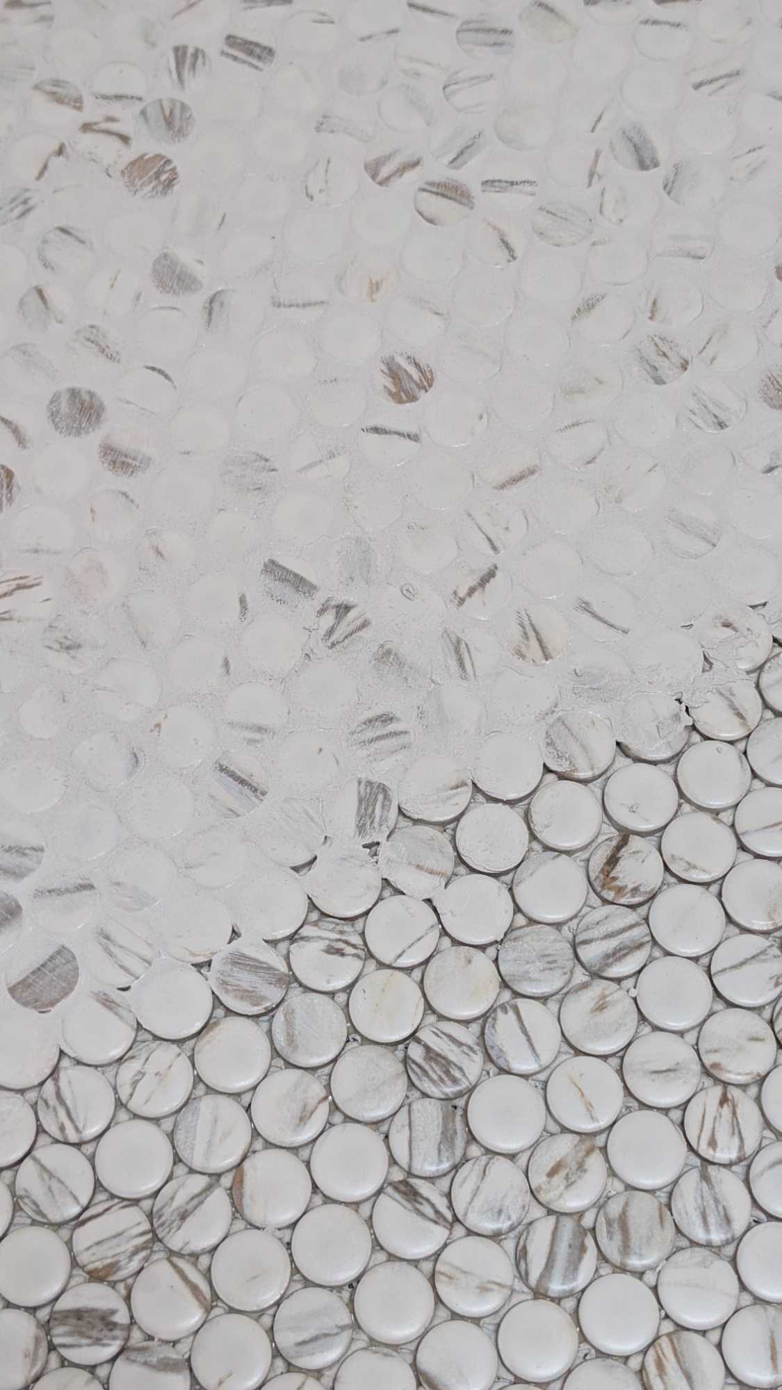 Grouting the pennies on the floor2