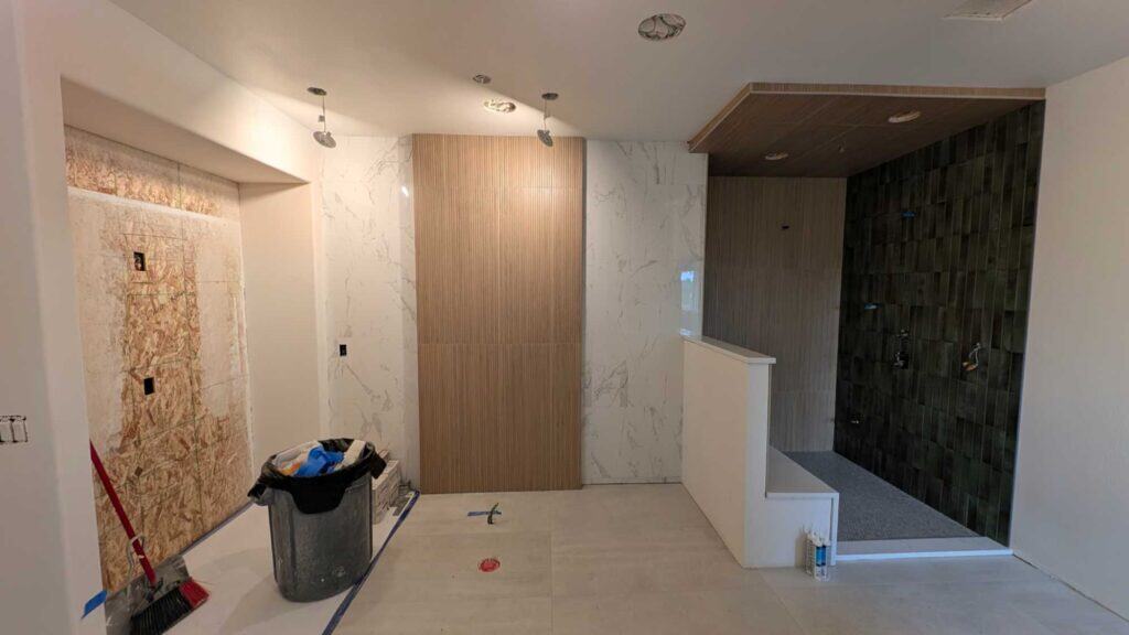 Most of primary bathroom is grouted and finished