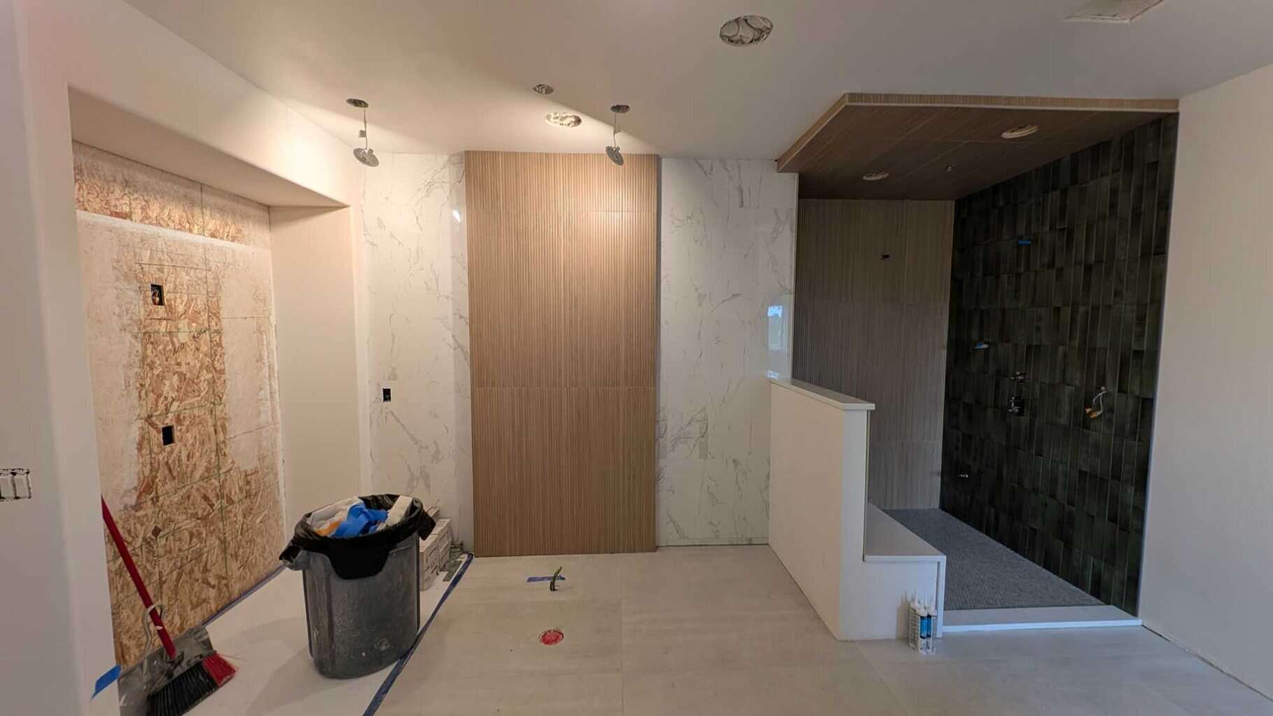 Most of primary bathroom is grouted and finished