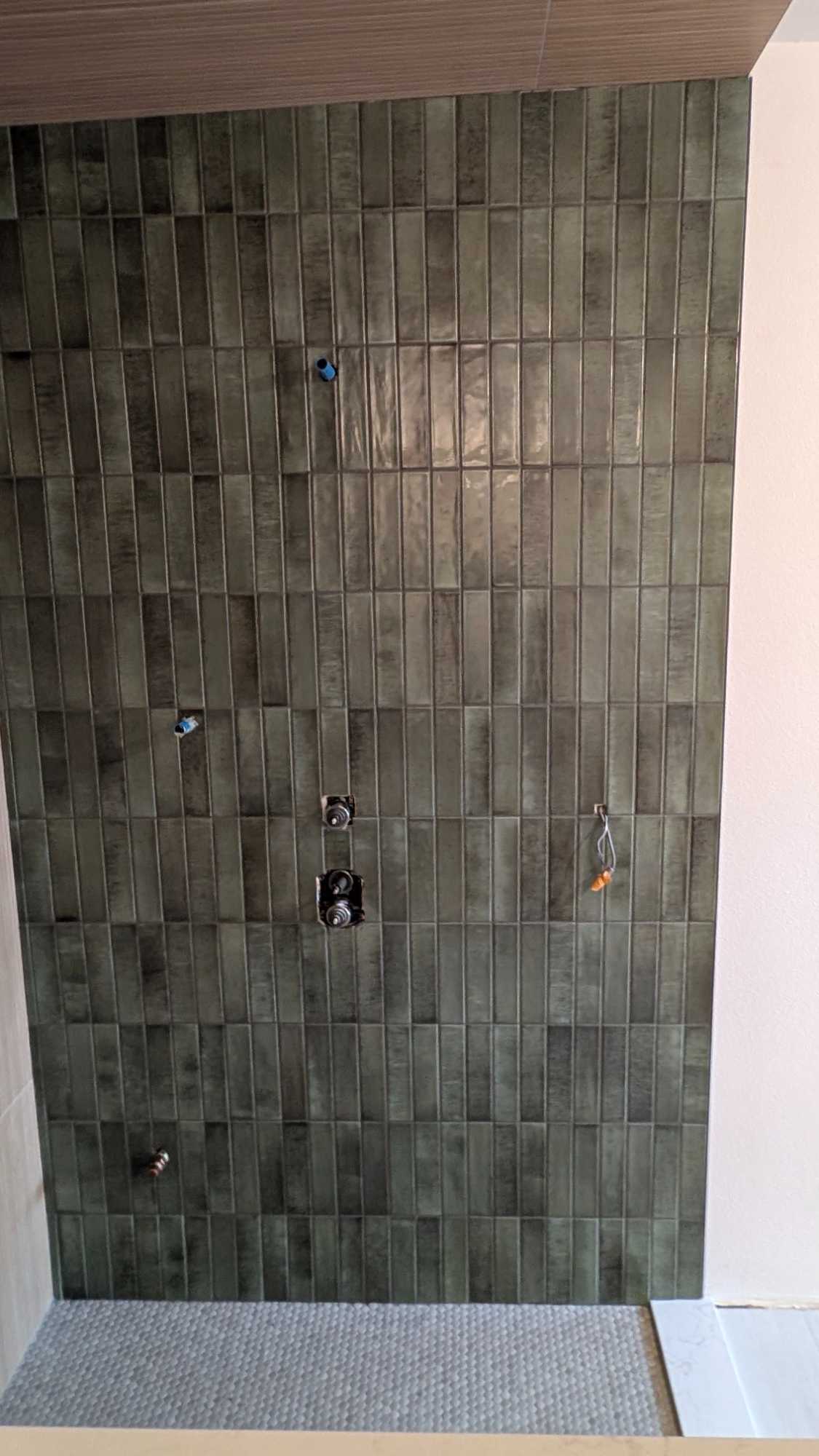 Grouted and finished accent wall in shower