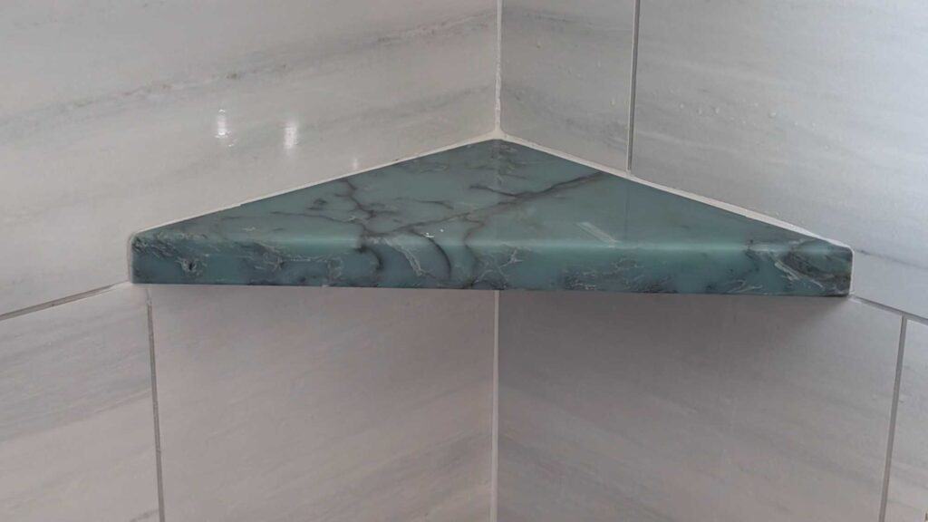 Stone corner caddies and shaving step