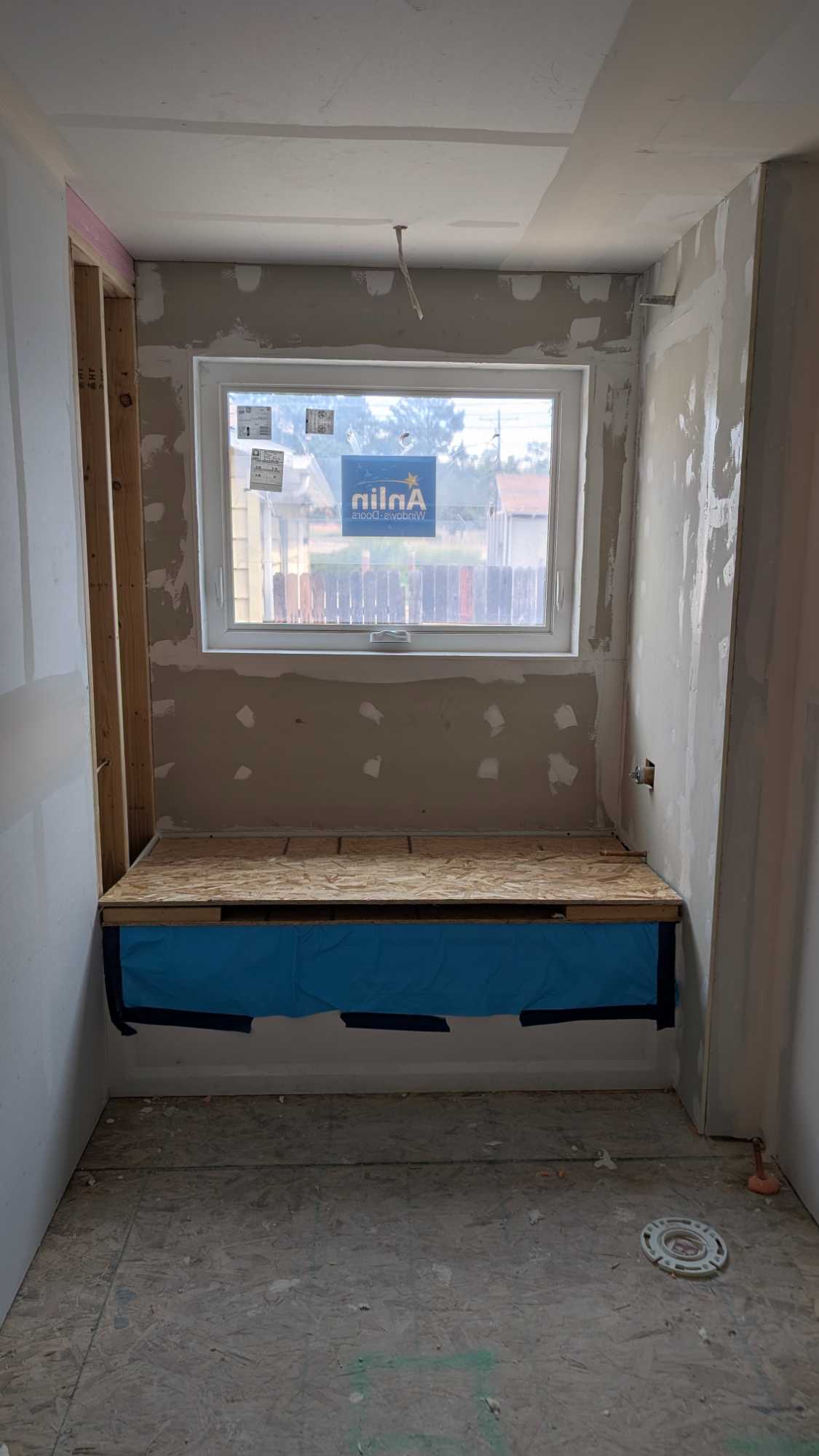 Underlayment installed except for one wall