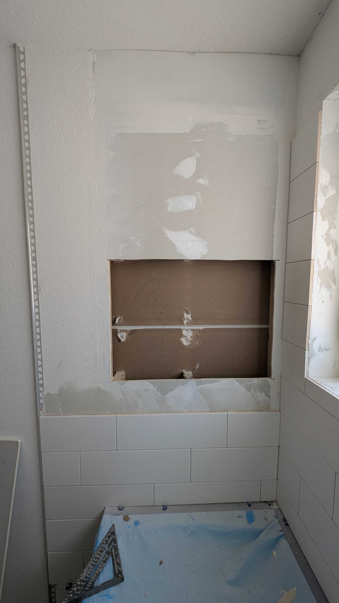 Removing studs to install niche