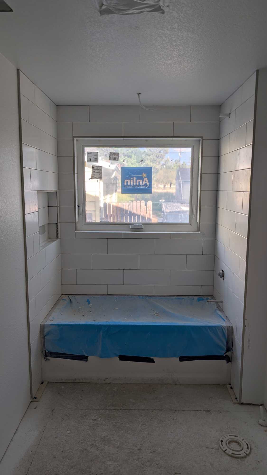 Tub surround almost completely set